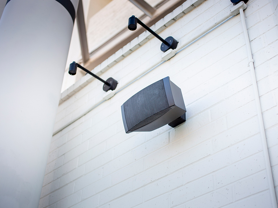 professional sound system equipment installed on a wall